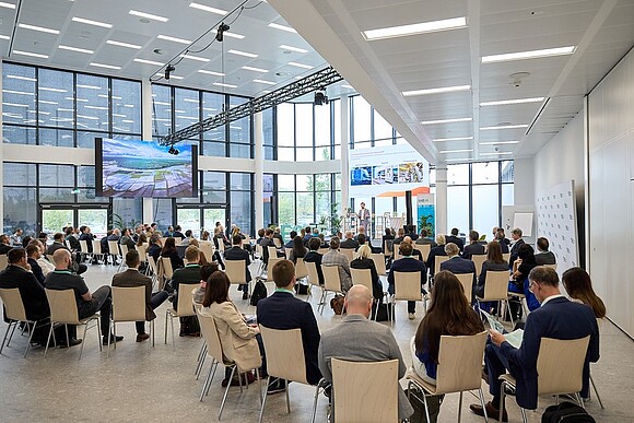 People sitting in the conference room during a presentation