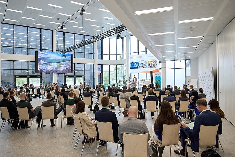 People sitting in the conference room during a presentation