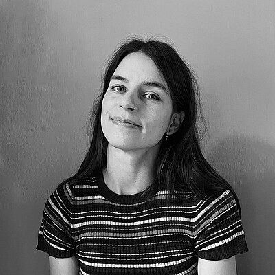 Portrait of a young woman with dark long hair