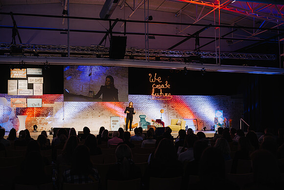 Photo of a woman on stage