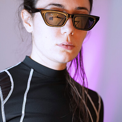 Portrait of a female artist with sun glasses