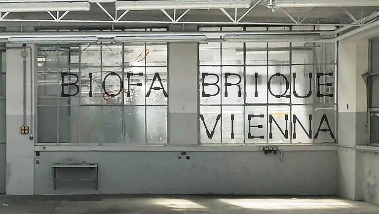 Biofabrique Vienna logo placed on window in exhibition space
