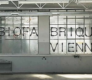 Biofabrique Vienna logo placed on window in exhibition space