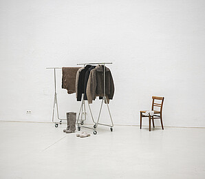 Wool products displayed on a clothes rack
