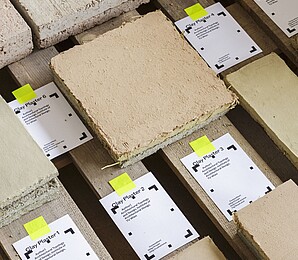 Pastel-coloured wall panels made from excavated material