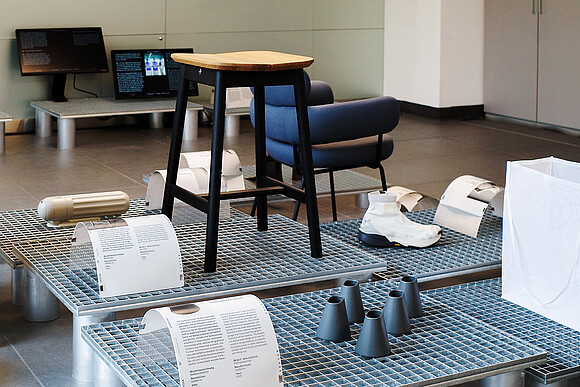 Austrian Design, stool, ceramic object and shoe in the foreground