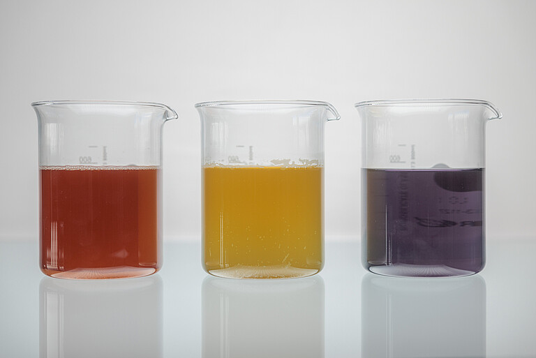 3 liquid color extracts in glass, red, yellow, purple